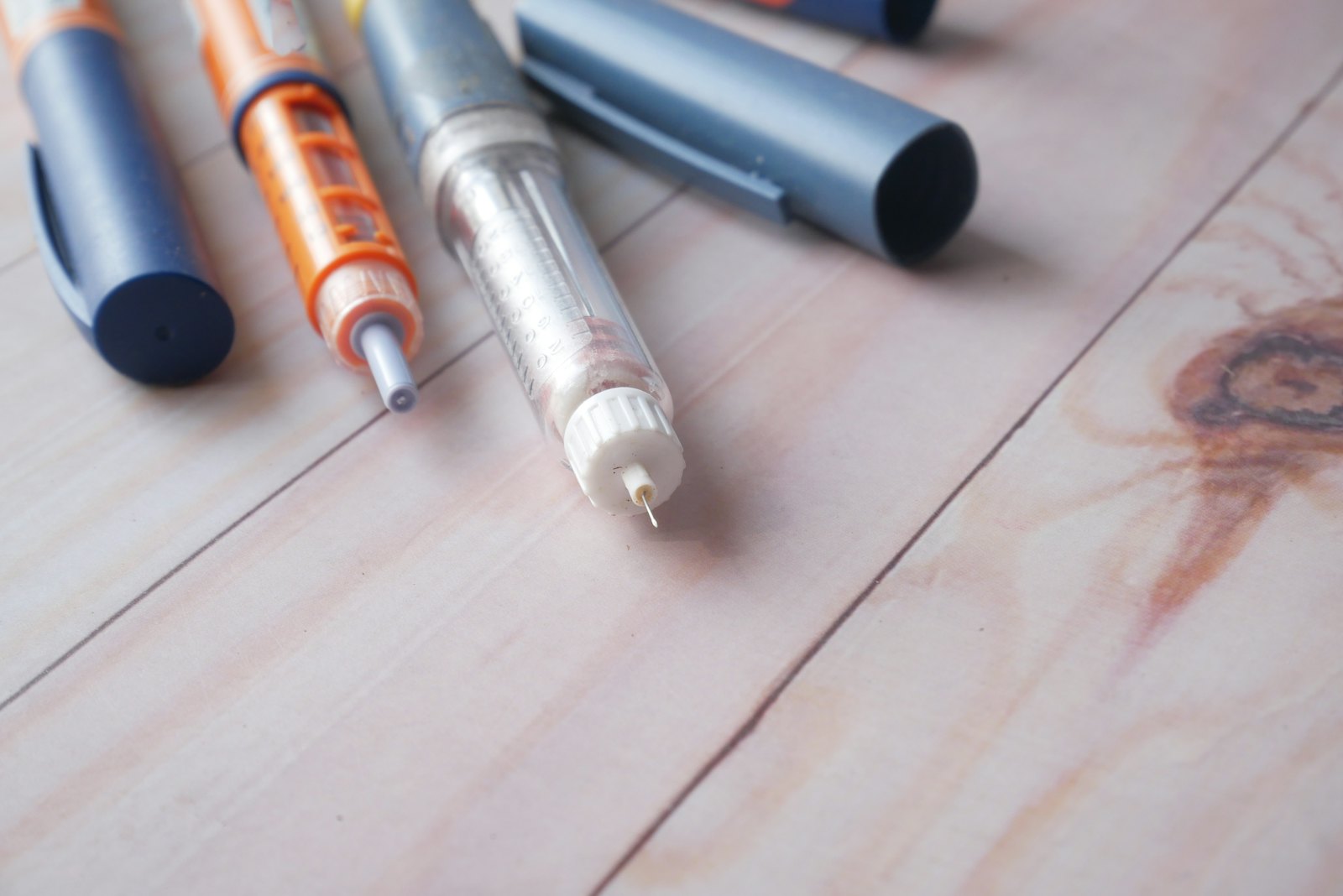 Ozempic gastroparesis lawsuit: GLP-1 injection pens on a table
